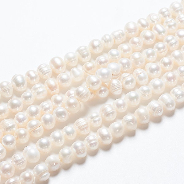 52 x grade A natural cultured freshwater pearls, potato, white, approximately 6-7mm, drilled, hole approximately 0.8mm
