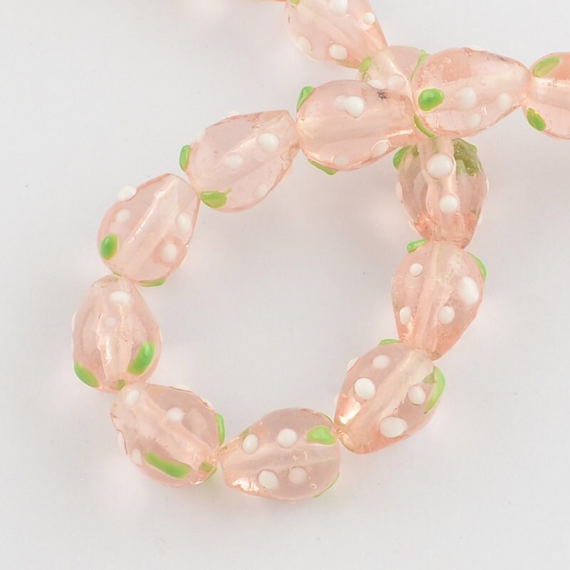 10 x handmade strawberry glass lampwork beads, pink/peach with white & green decoration, approximately 16mm x 11mm, drilled 2mm hole