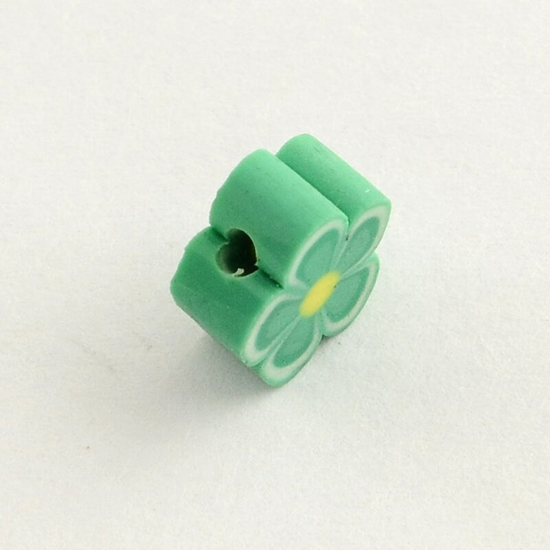 100 drilled handmade polymer clay beads, flowers, multi coloured, sized approximately 6-8mm x 4mm, drilled hole approx 2mm