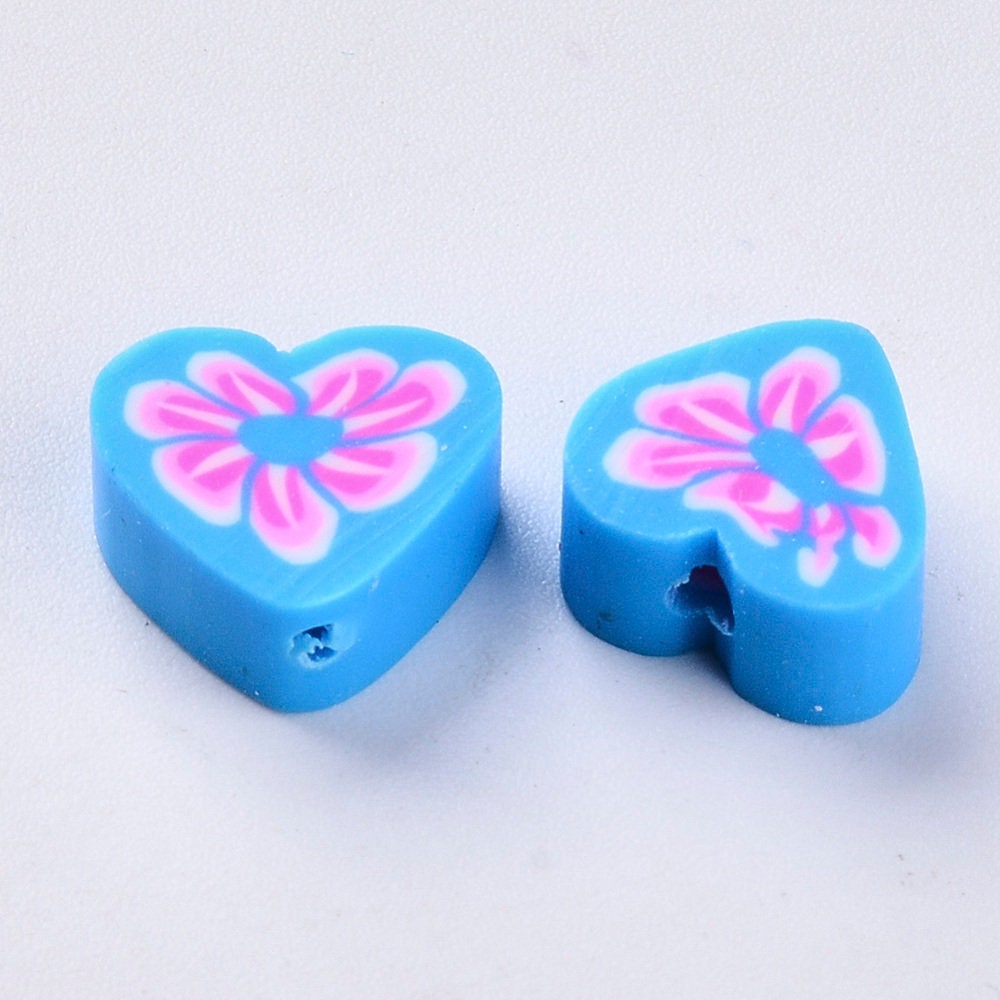 Small heart shaped clay polymer beads with floral pattern, various colours, size approx 9 - 11mm x 10 -11mm x 4 - 5mm, hole approx 2mm
