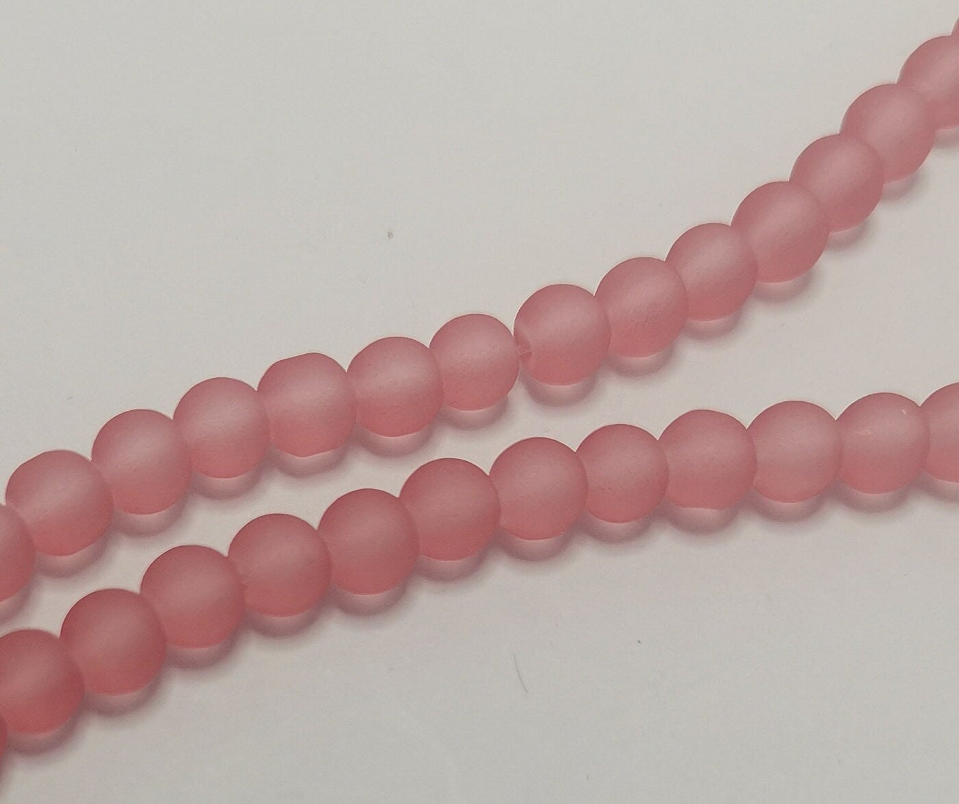7 colours - 200 beads - 1 x 30" strand (approximately 200 beads) small 4mm transparent frosted round glass beads, drilled