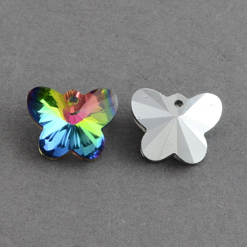 5 x faceted glass butterfly pendants, electroplated, rainbow coloured, 1mm hole, silver tone underneath, approx. 12mm x 15mm x 7mm