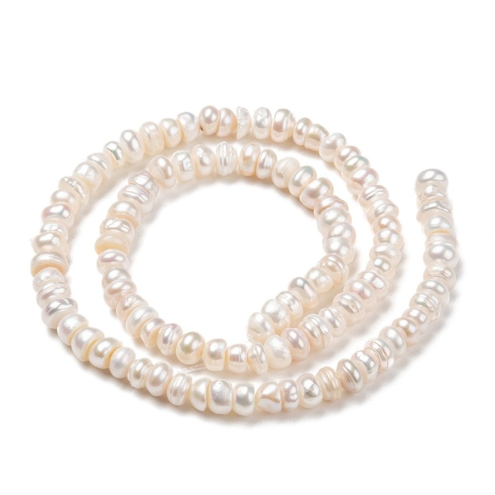 55 natural cultured grade A freshwater pearls, antique white colour, potato, approximately 7-8mm x 6-7mm, drilled, hole approx 0.8mm