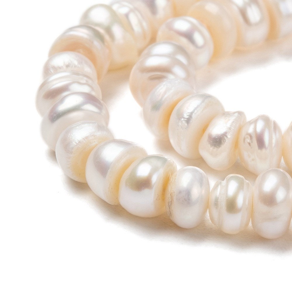 55 natural cultured grade A freshwater pearls, antique white colour, potato, approximately 7-8mm x 6-7mm, drilled, hole approx 0.8mm