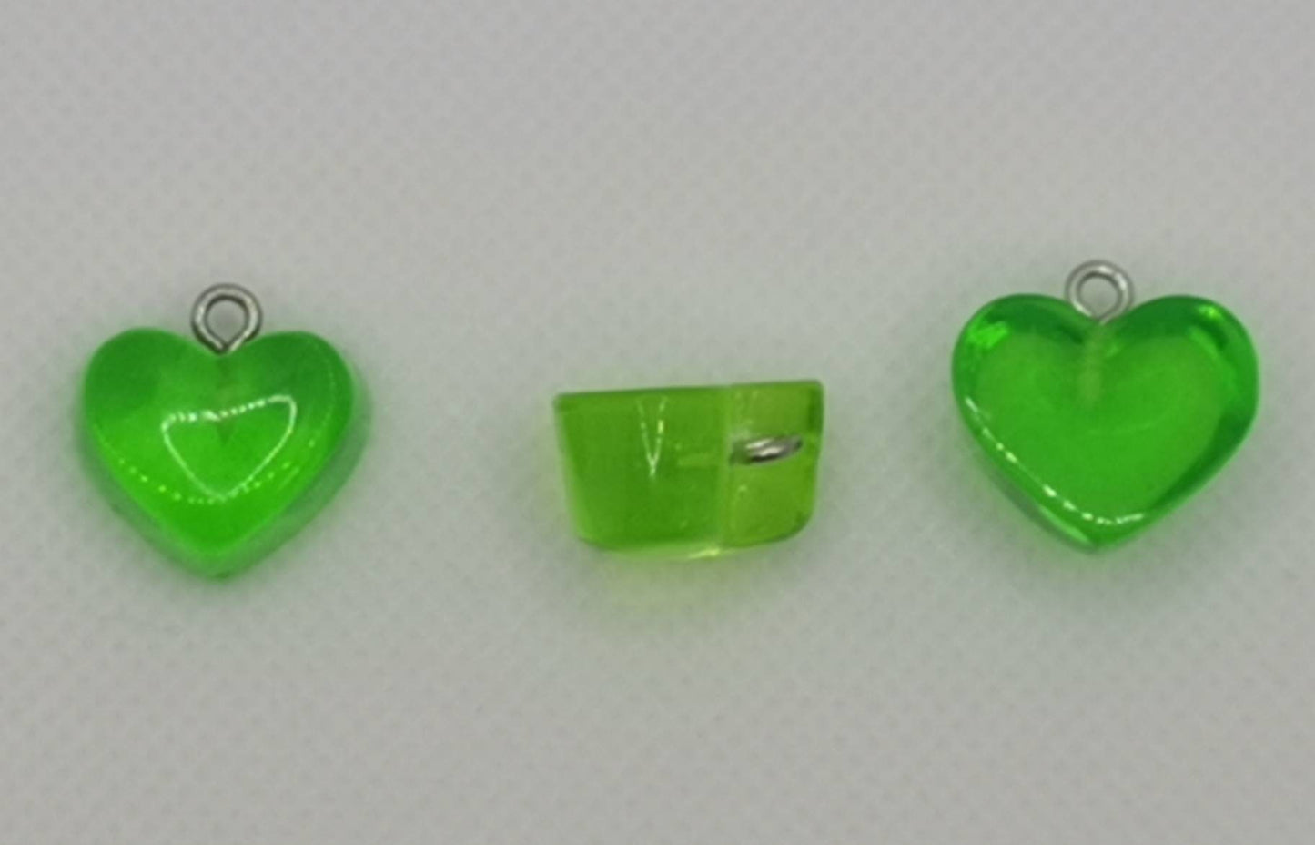 5 x resin heart pendants, translucent, silver tone loop, various colours, approximately 16.5mm x 17mm x 9.5mm, hole approx 1.8mm