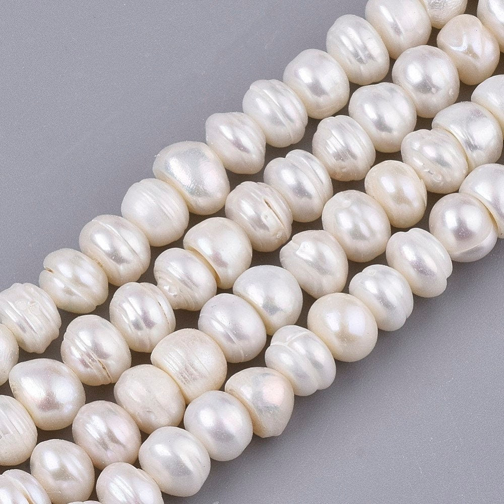 55 natural cultured grade A freshwater pearls, antique white colour, potato, approximately 7-8mm x 6-7mm, drilled, hole approx 0.8mm