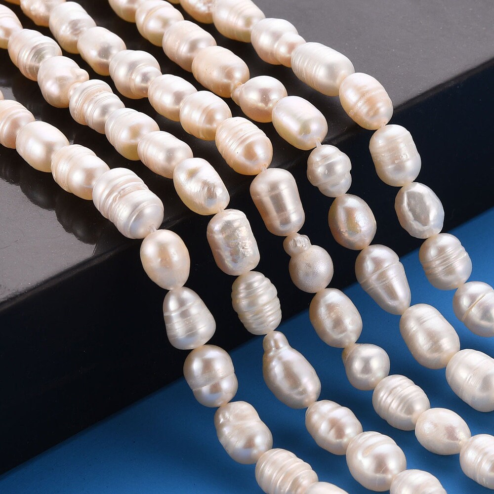 22 x natural cultured freshwater pearls, seashell colour, rice shape, approximately 7-9mm x 6-7mm, drilled, hole approximately 0.5mm