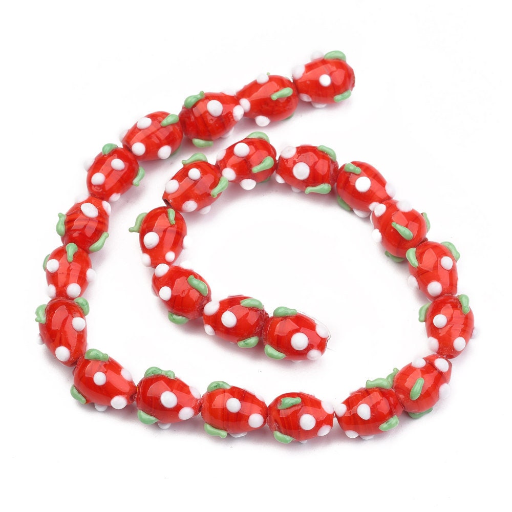Handmade strawberry glass lampwork beads, red with white & green decoration, approximately 12.5mm x 10mm, drilled hole approx 2mm