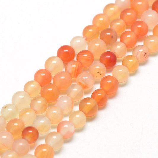 1 x strand of 6mm natural undyed orange carnelian beads, round, drilled with 1mm hole, approximately 62 beads per strand
