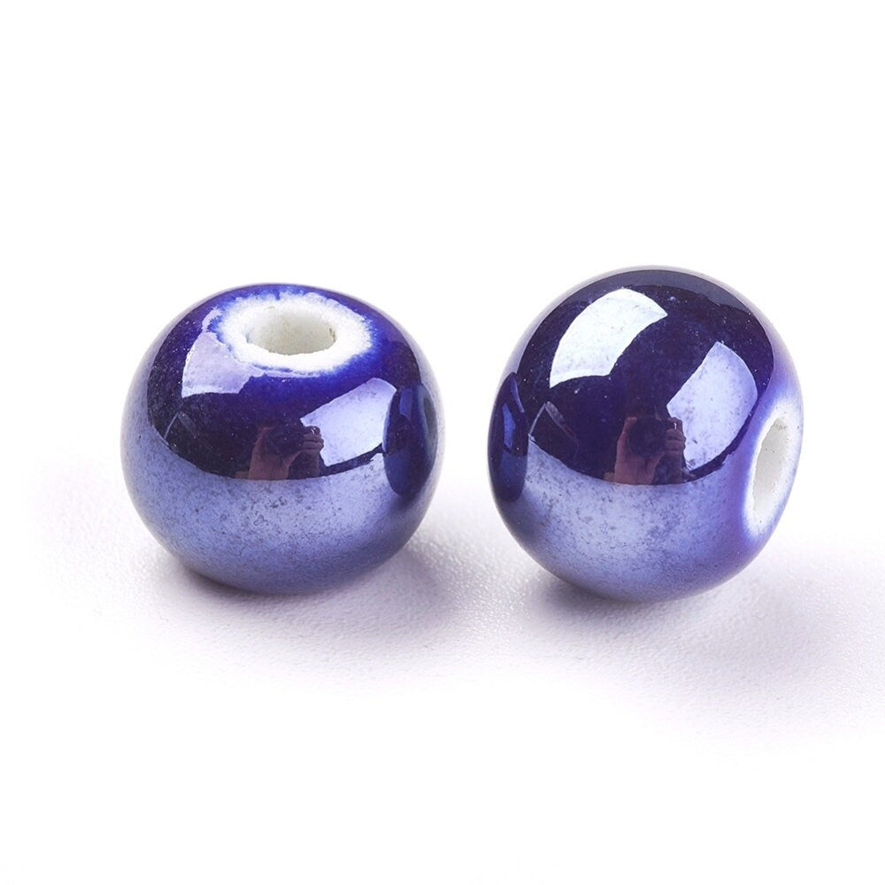 20 x blue, mauve, white handmade pearlised porcelain 10mm beads, round, drilled (hole approximately 2-3 mm)