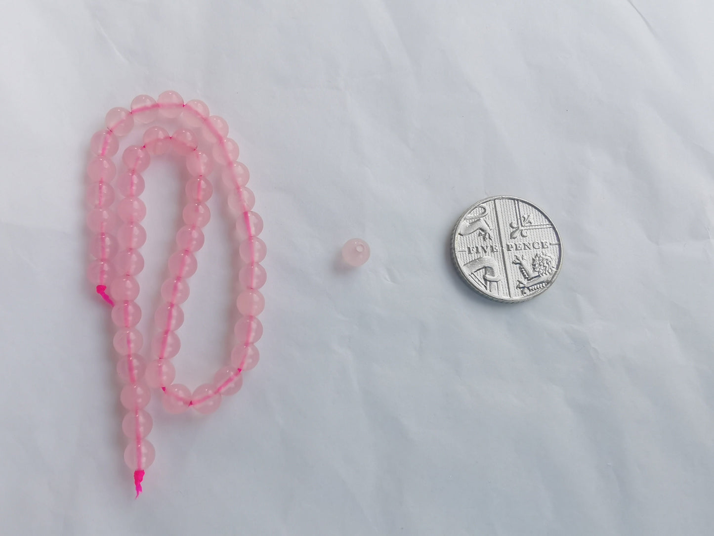 45 x natural undyed rose quartz beads, round, 4mm, drilled, hole approximately 1mm