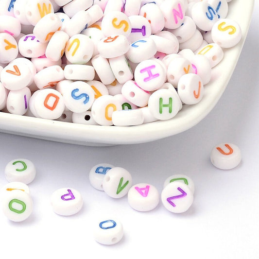 100 x small white opaque round beads, printed with various individual coloured letters, approx 7.5mm x 4 mm, drilled hole approx 1.3mm