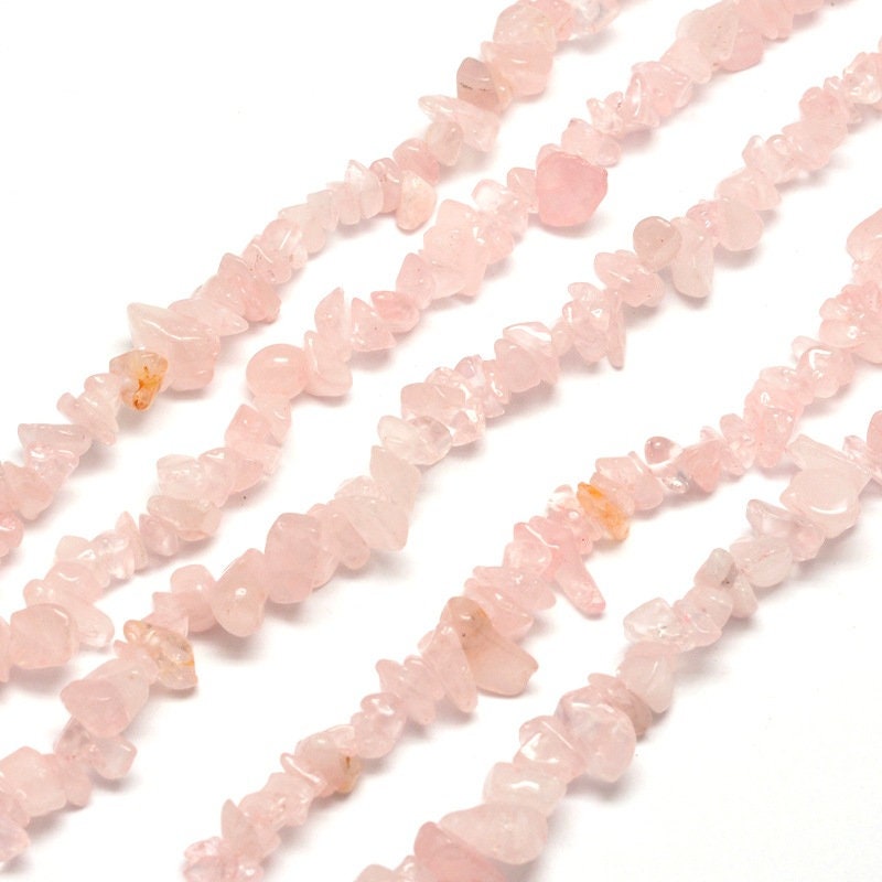 Strand 200 rose quartz chip beads, pale pink, 3-6 x 3-6mm, drilled with 1mm hole (approx), strand approximately 31.5 inches