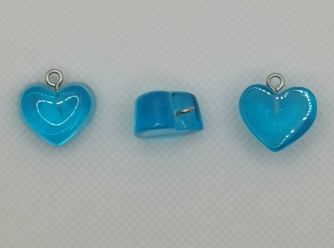 5 x resin heart pendants, translucent, silver tone loop, various colours, approximately 16.5mm x 17mm x 9.5mm, hole approx 1.8mm