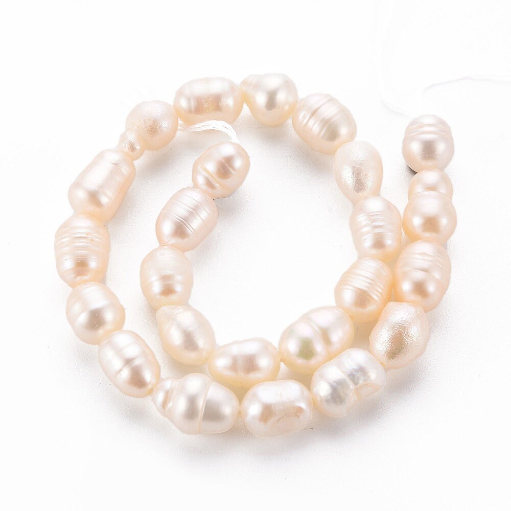 22 x natural cultured freshwater pearls, seashell colour, rice shape, approximately 7-9mm x 6-7mm, drilled, hole approximately 0.5mm