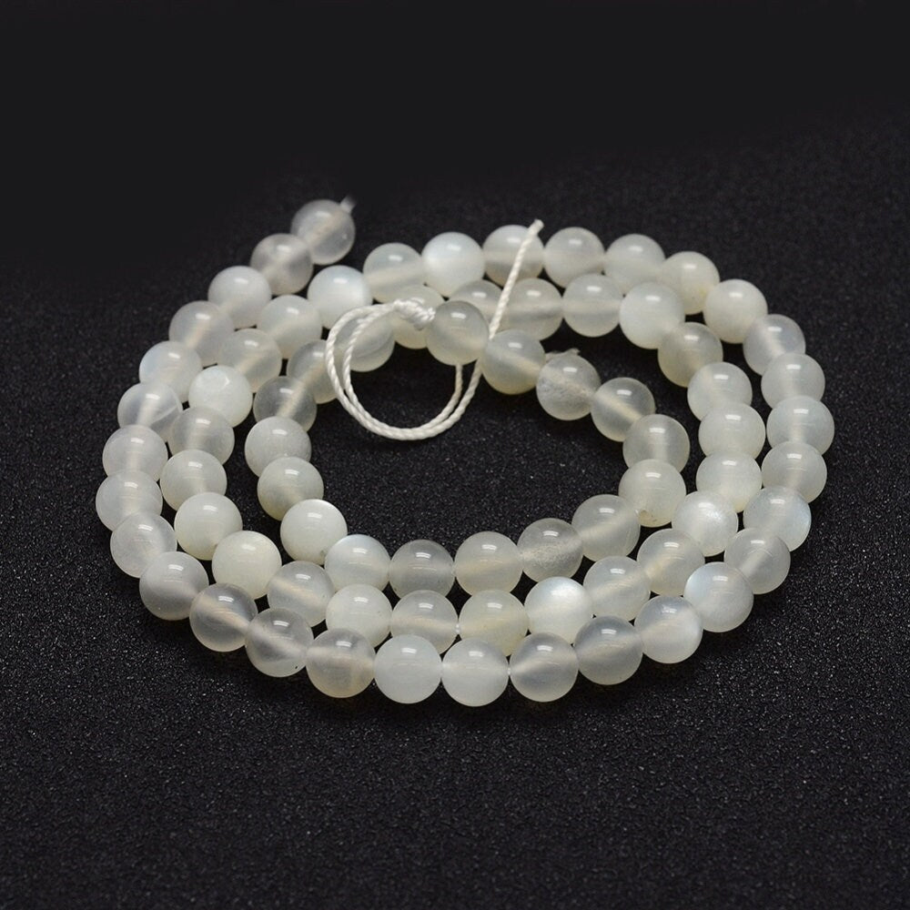 Natural undyed white moonstone gemstones, round, 6mm, hole: 1mm, approximately 65 per strand