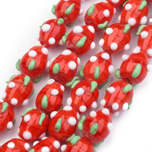 Handmade strawberry glass lampwork beads, red with white & green decoration, approximately 12.5mm x 10mm, drilled hole approx 2mm